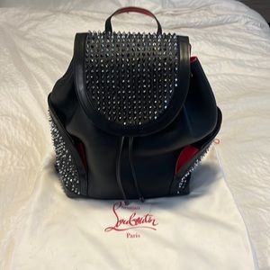 Christian louboutin men’s back pack. But I used it few times for travel bag.